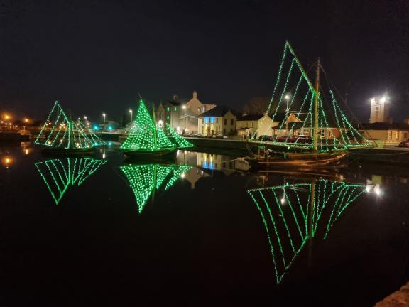 Boats lit green