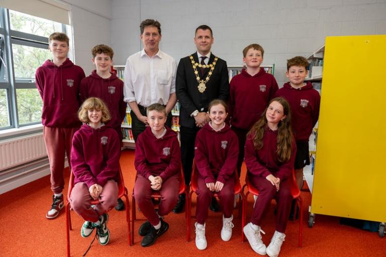 A group of children with Mayor Eddie Hoare and Minister Eamon Ryan at Scoil Iognáid in May 2024.