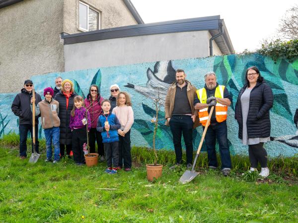 Staff and Residents in Wellpark Grove at new mural